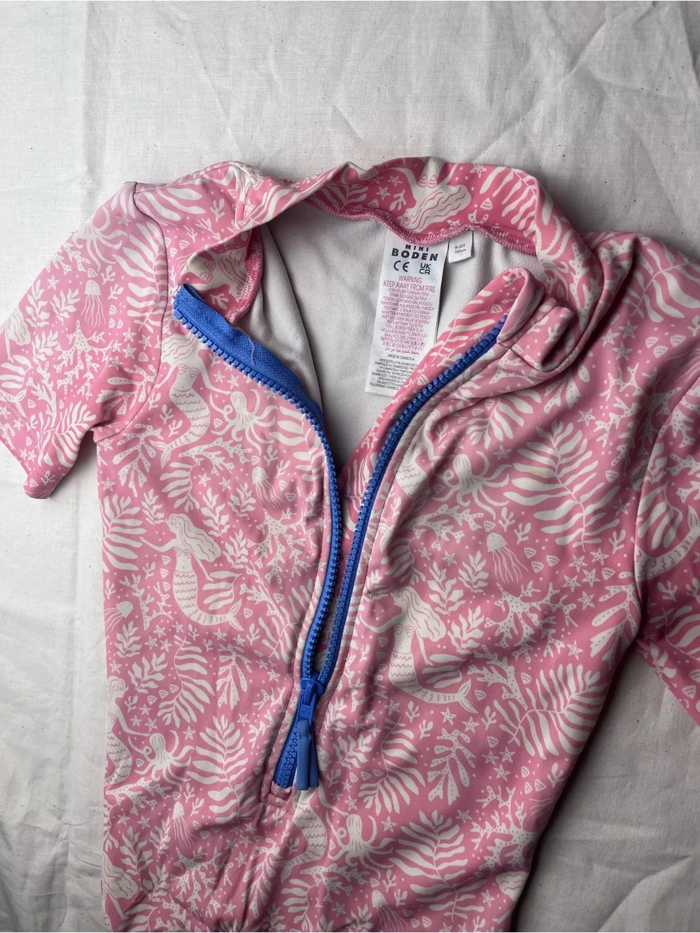 Mini Boden Girls' Pink Short-Sleeve Zip Front Rash Guard Swimsuit Mermaid Print